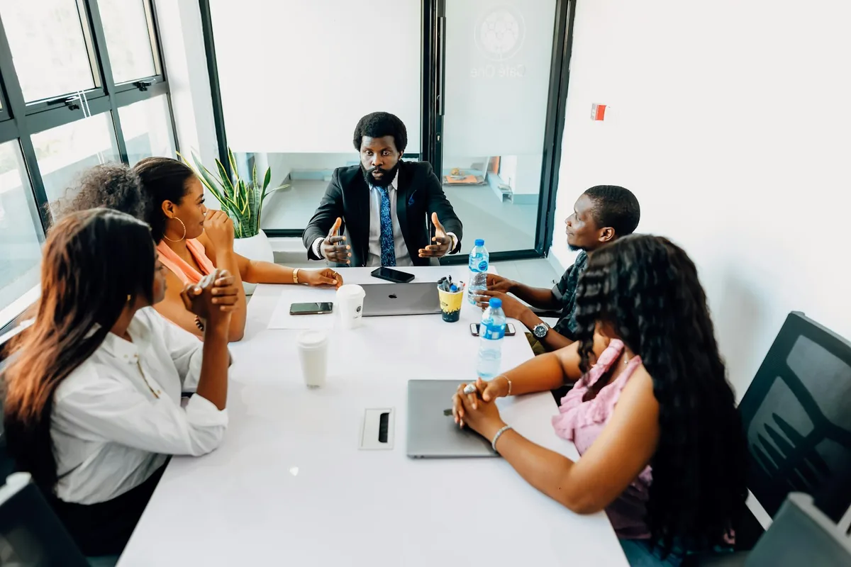 A mass-tort litigation team reviewing a multi-plaintiff campaign in a boardroom.