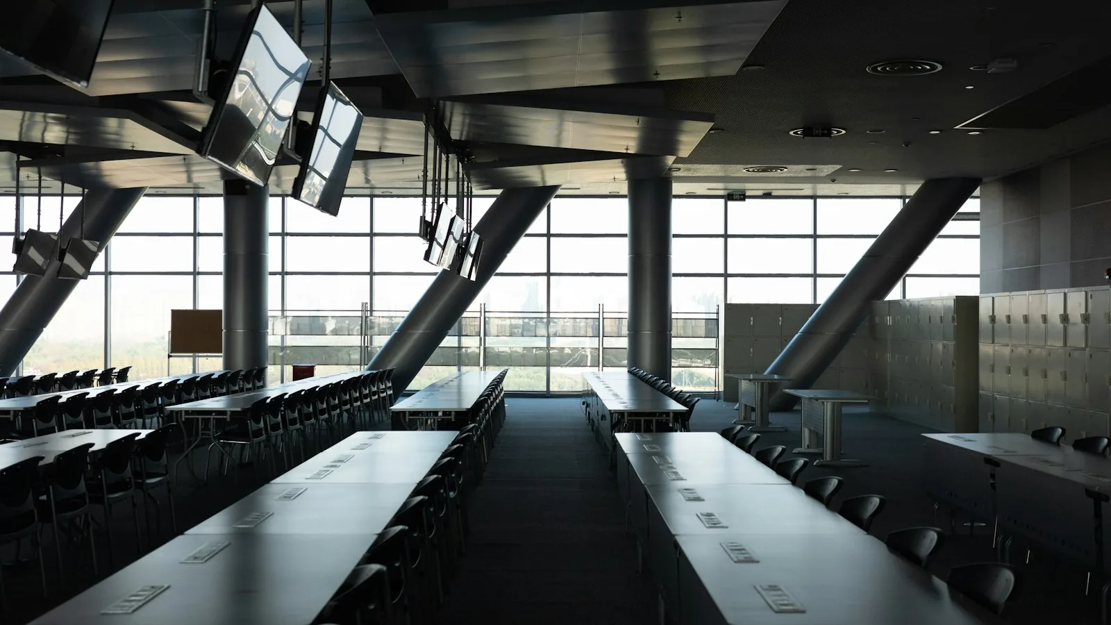 A modern office where a team monitors website performance metrics.